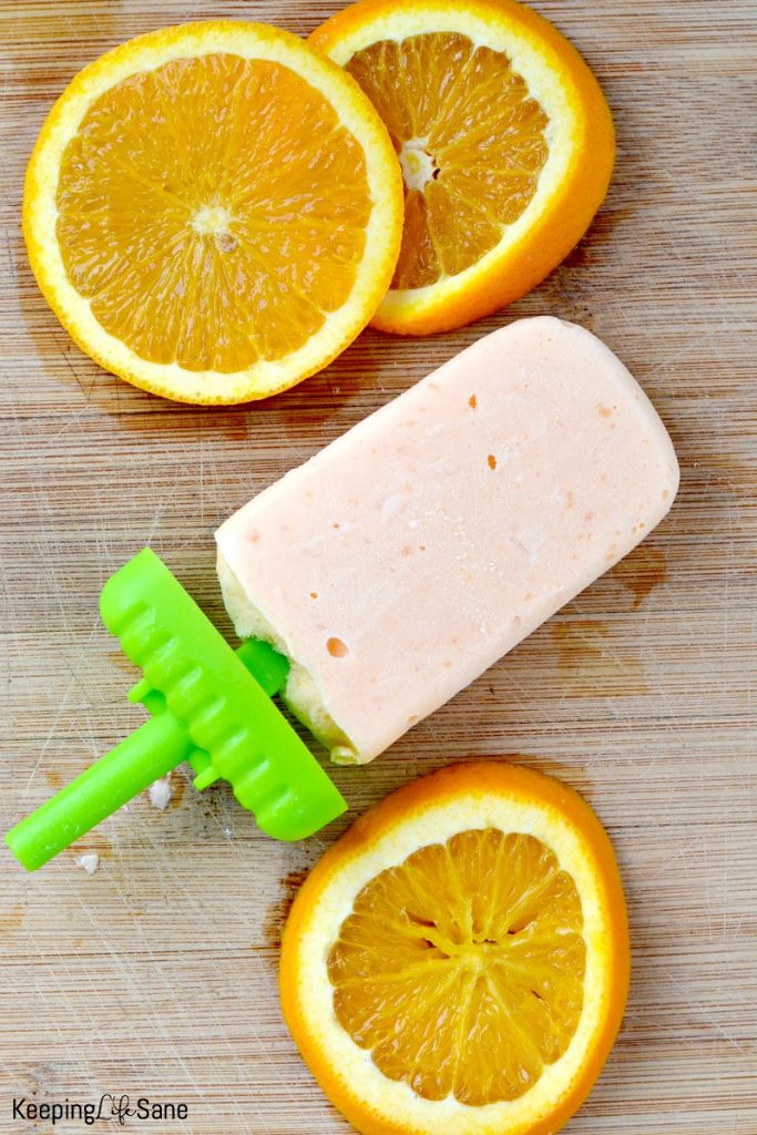 Your kids are going to love these orange ice cream bars. This summer recipe is super easy to make with only 2 ingredients.