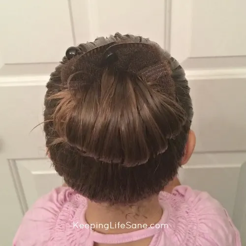 hot buns clipped in hair to make bun but hair not spread out on it
