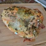 overhead view of cooked turkey breast on cutting board