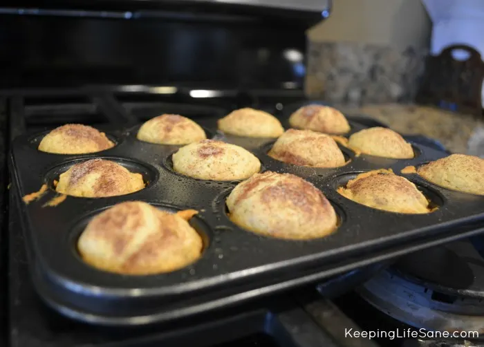 mini applesauce muffins recipe in mini muffin tin on stove