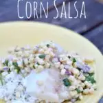 yellow plate with rice cod and corn salsa