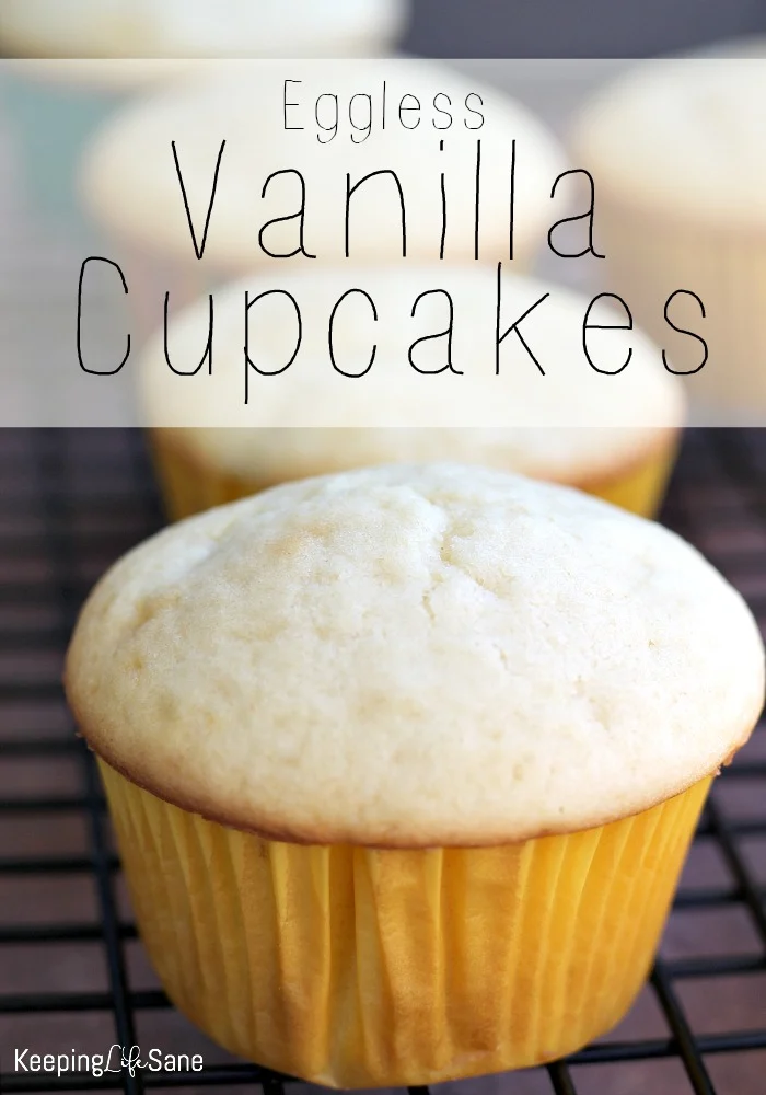 closeup of vanilla cupcakes on a cooling rack