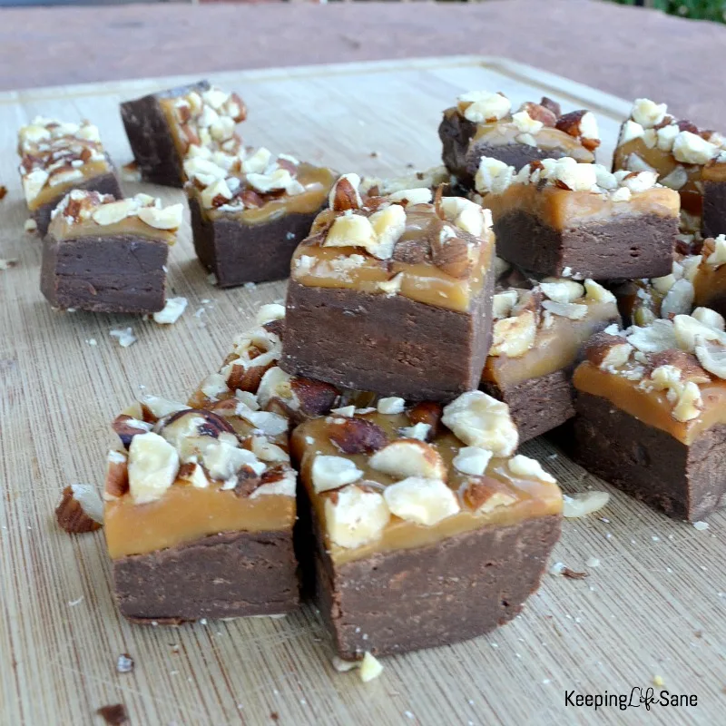 view of chocolate hazelnut caramel fudge on cutting board.