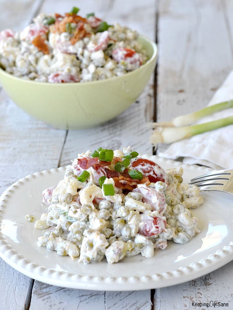 Creamy pea salad with bacon is the perfect side to any lunch or dinner AND easy dish for your next potluck. It's a painless way to get your kids to eat those veggies!