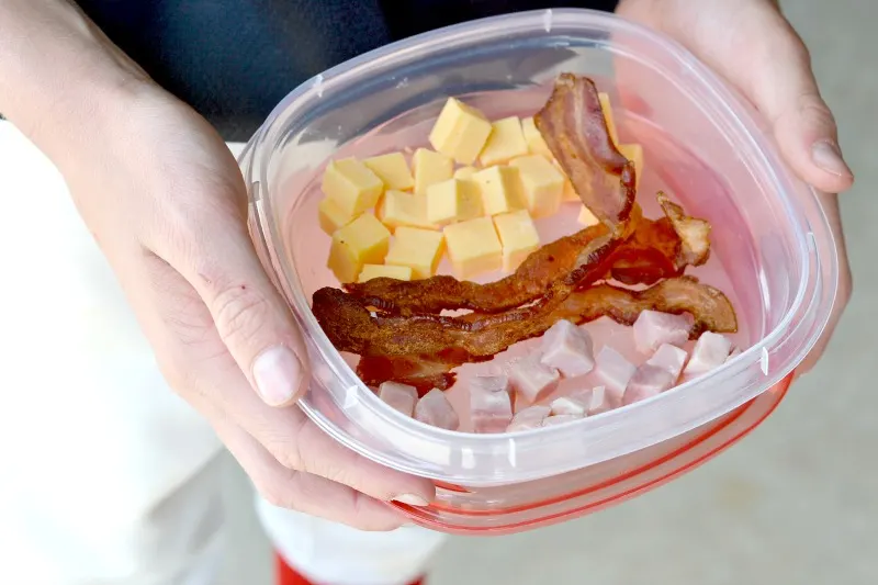 baseball player holding portable protein packs