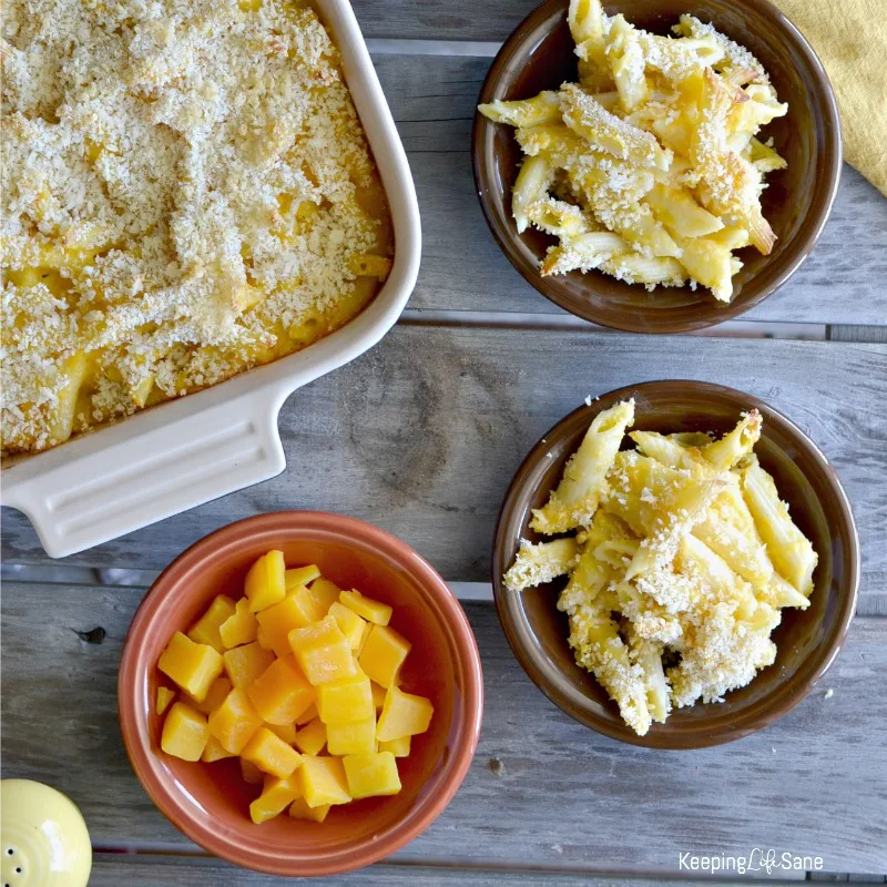 Overhead view of two small bowls of butternut squash Mac n cheese