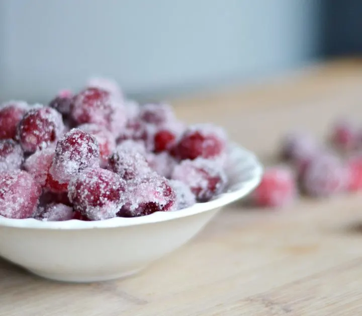 These EASY sugared cranberries are the perfect treat for Thanksgiving or Christmas. Make them ahead of time and pull them out to snack on!