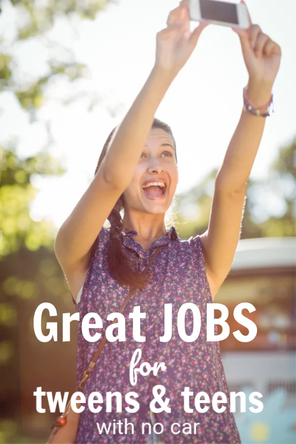 teen girl outside with arms raised up in the air taking a selfie with her phone