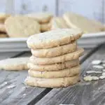 stack of almond shortbread cookies on wooden table