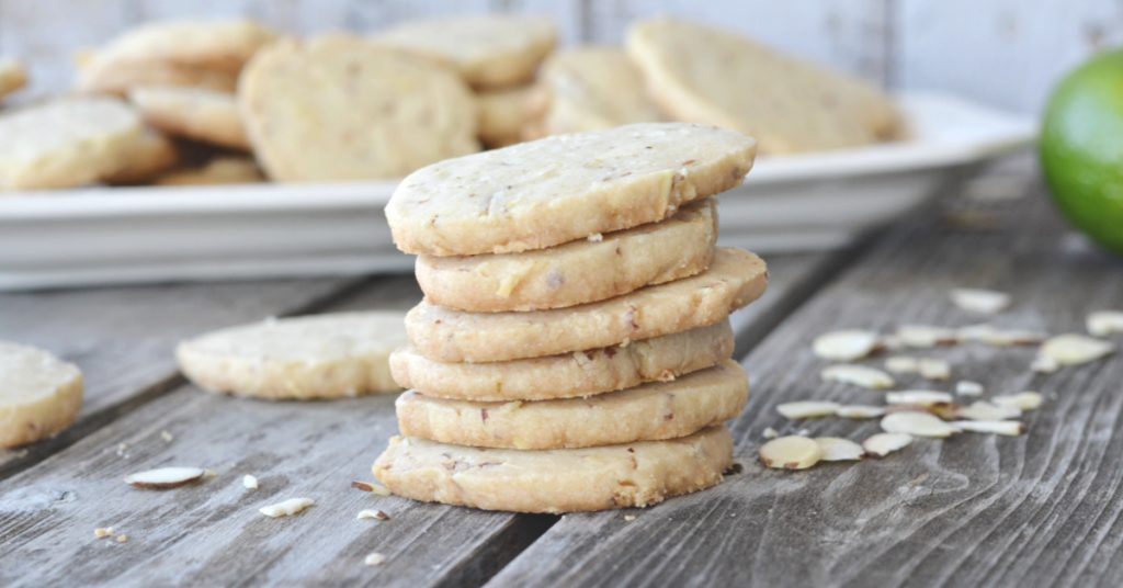 stack of almond shortbread cookies on wooden table
