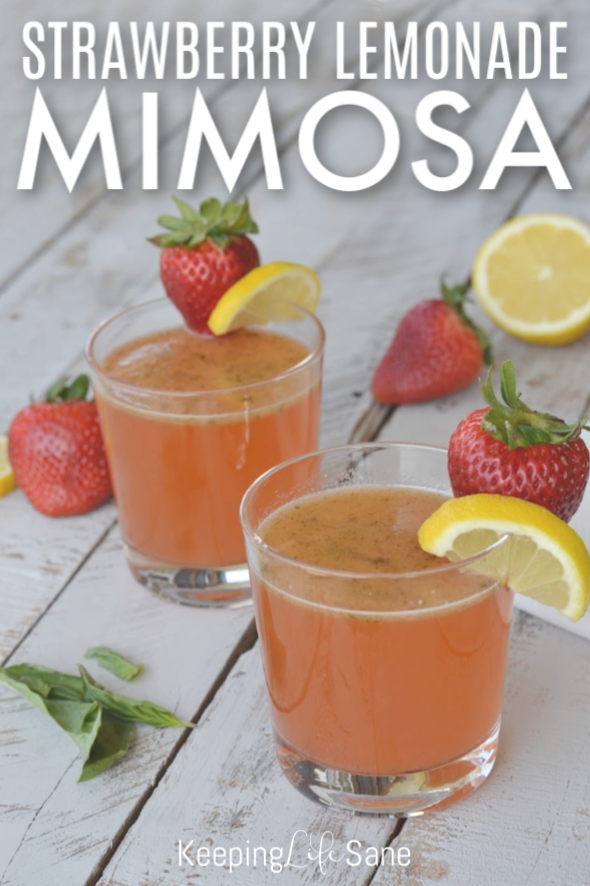two clear glasses with strawberry lemonade mimosas with lemon on side of glass with basil leaf