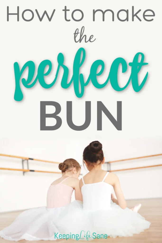 2 girls in dance outfits sitting in a dance room with buns
