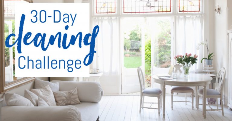 white round kitchen table near doors with white curtains that open with flower on table