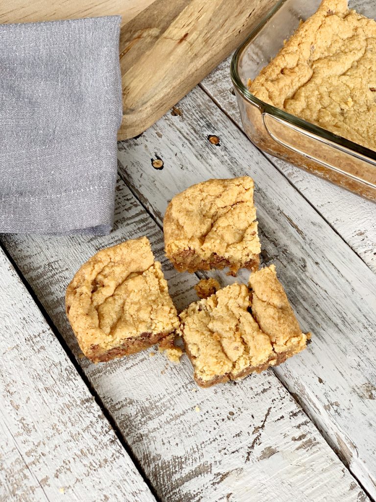 These eggless chocolate chip cookie bars are a family favorite. This easy dessert won't last long. Who doesn't like soft and chewy cookie bars?