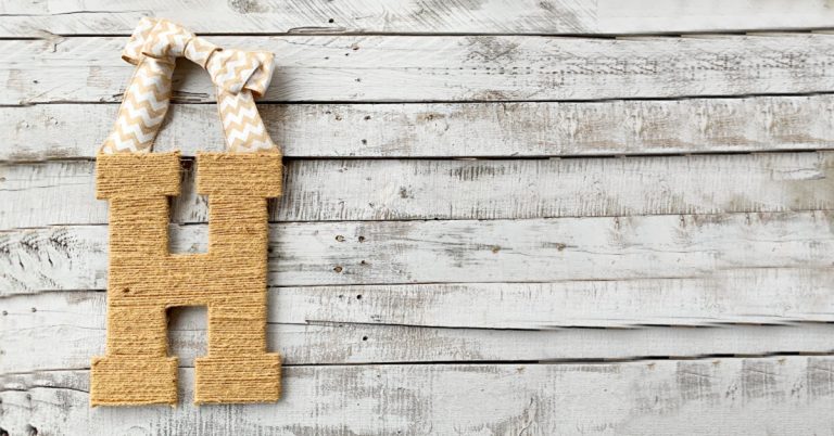 Are you looking for an EASY afternoon craft? This cheap DIY front door initial is exactly the project you need. It's perfect for all seasons & only $10!