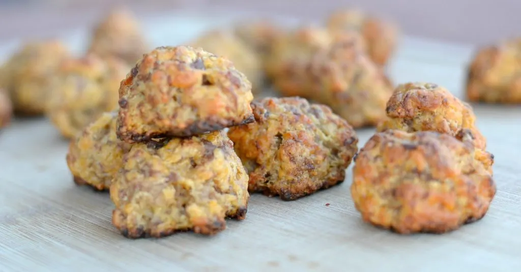 easy sausage balls with cheese on a cutting board