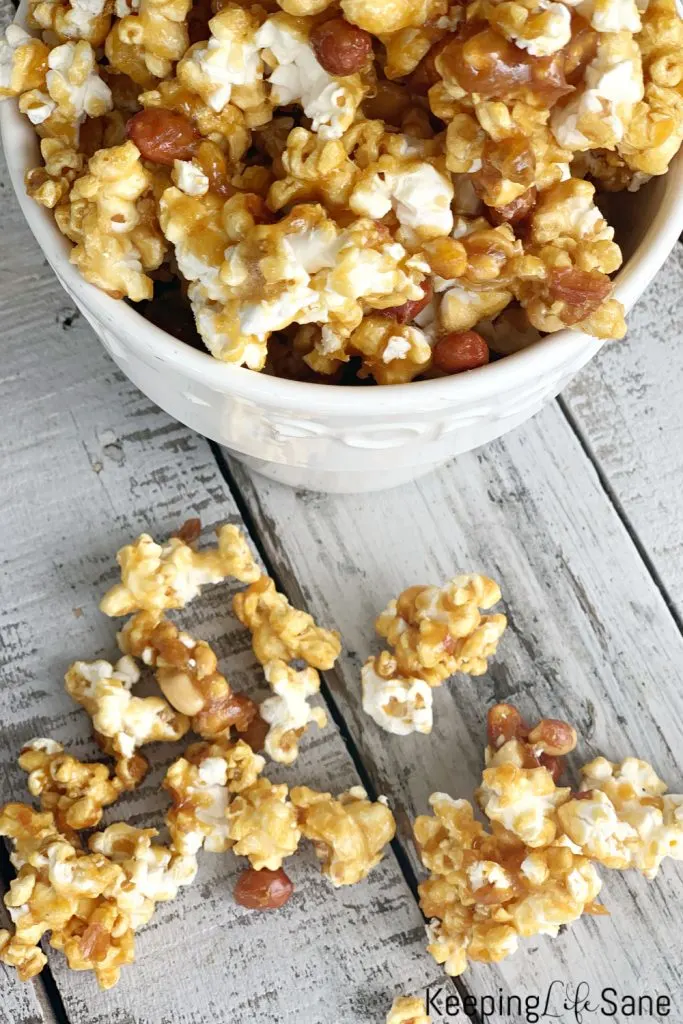 caramel popcorn in popcorn bowl spilling over