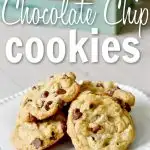 white plate with stach of chocolate chip cookies