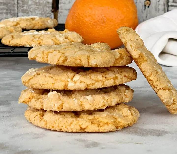 view of stacked up orange cake mix cookies