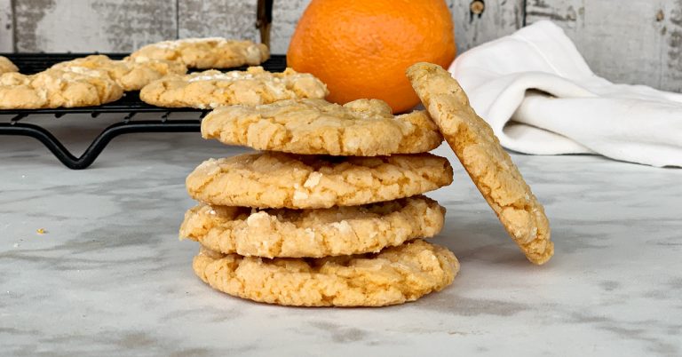 view of stacked up orange cake mix cookies