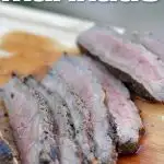 juicy sliced London Broil on cutting board