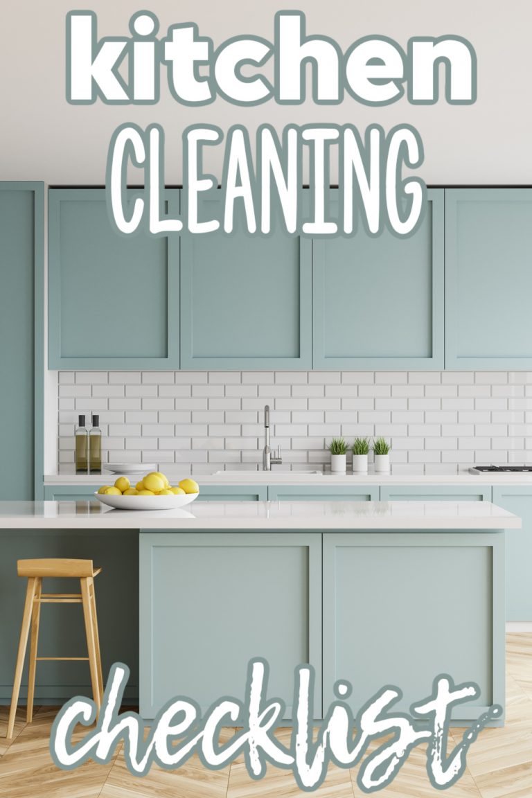 kitchen with light blue cabinets and white counters with white bowl with lemons and wooden barstool