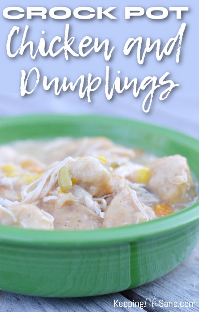 Easy crock pot chicken and dumplings in a green bowl