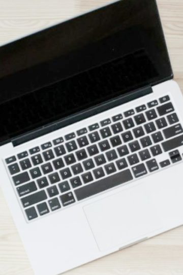 laptop computer sitting on a desk