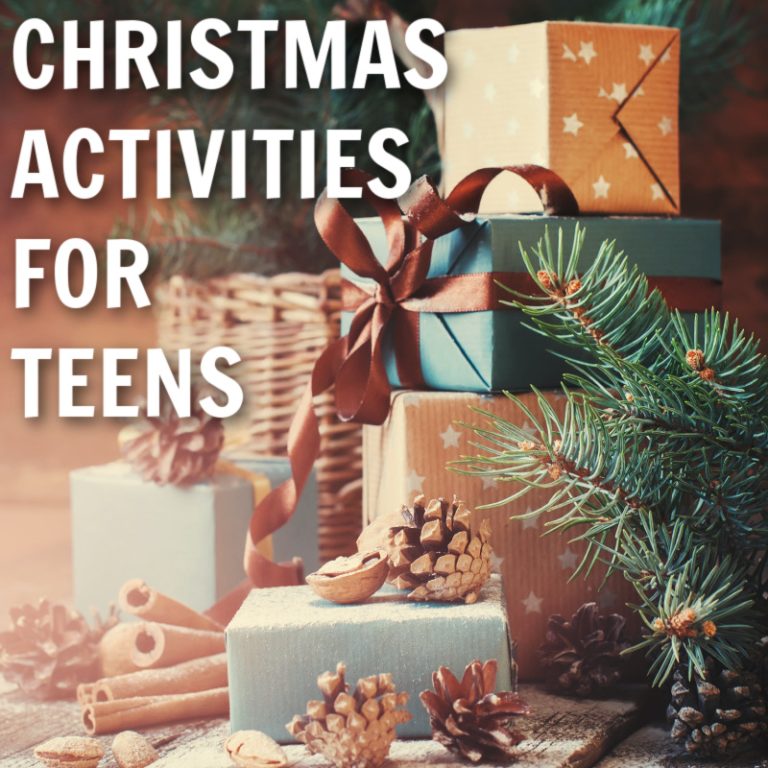 pastel christmas packages with pine needs and pinecones